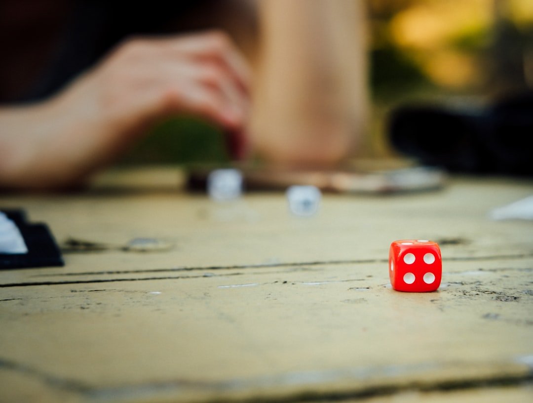 close-up-photo-of-red-dice-y6uilkrsyms